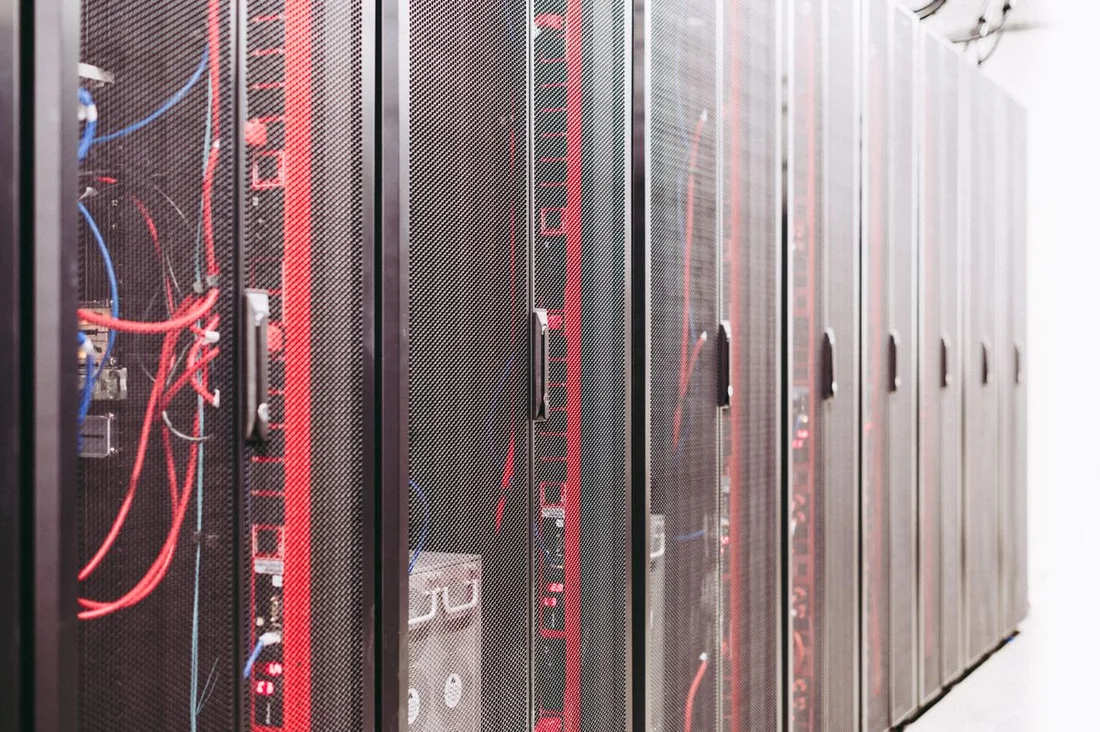 Full-height server cabinets in an equipment room