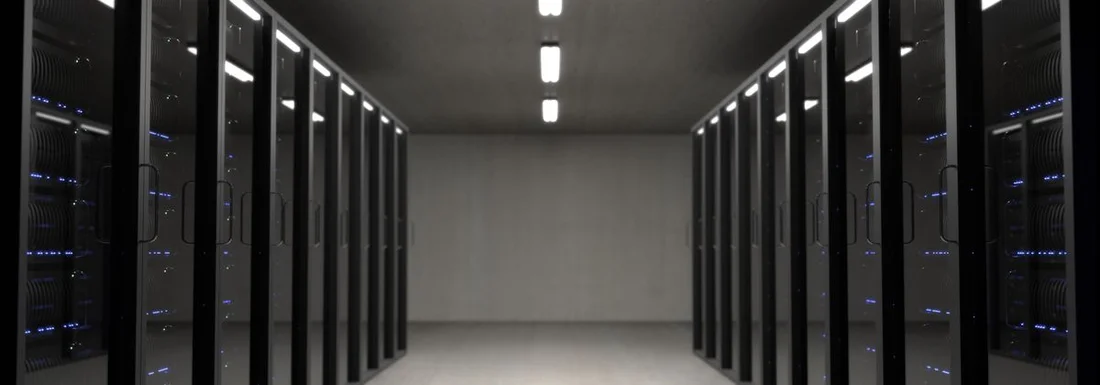 Aisle between rows of physical server cabinets